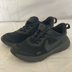 Boy black nike sneakers